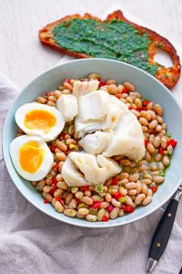 Kabeljau-Confit auf Bohnensalat mit Piso